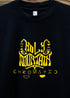 Holy Mountain Shirt-Chromatic Coffee-Holy Mountain Shirt-Chromatic Coffee-Holy Mountain Shirt-Chromatic Coffee-Holy Mountain Shirt-Chromatic Coffee-Holy Mountain Shirt-Chromatic Coffee-Holy Mountain Shirt-Chromatic Coffee-Black t-shirt with yellow graphic design on a wooden surface